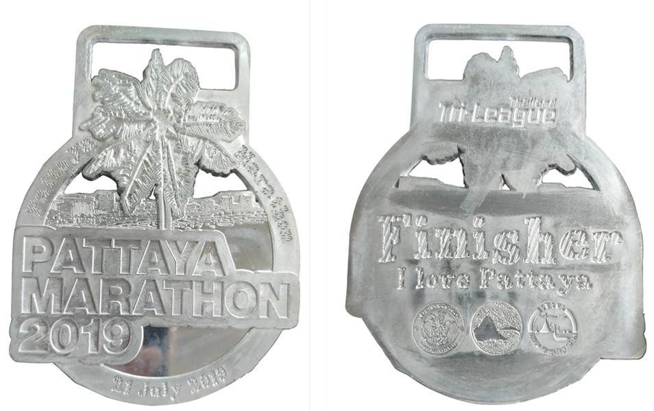 Front and back of the Pattaya medal metal sample